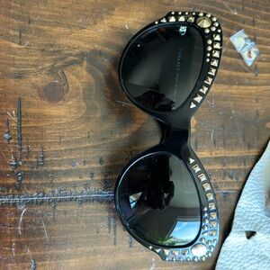 metal studded versace sunglasses, feline-esque in most excellent condition.